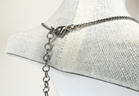 Excellent Pre-Loved Silver Tone Metal with White and Light Yellow Crystal Embellished Floral Pendant Drop Necklace. (clasp)