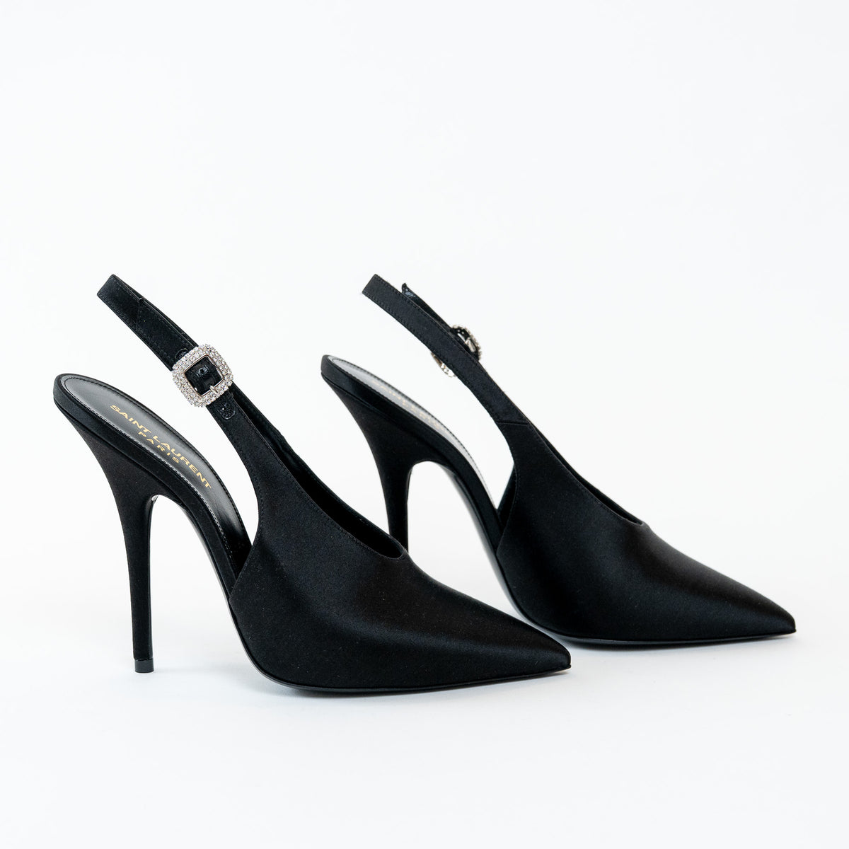 Saint Laurent Black high-heeled satin shoes with slingback design on a white background