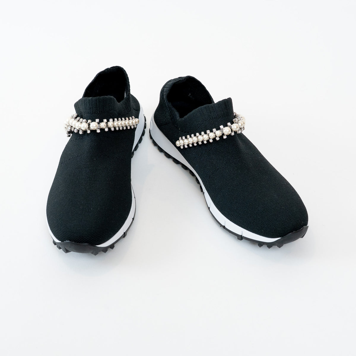 Jimmy Choo Verona Black Knit slip-on shoes with faux pearl and crystal details on a white background