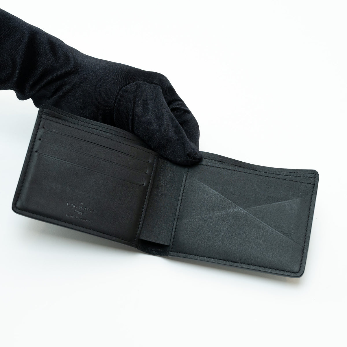 Louis Vuitton Black Smooth Leather Monogram Embossed Bifold Wallet