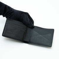 Louis Vuitton Black Smooth Leather Monogram Embossed Bifold Wallet