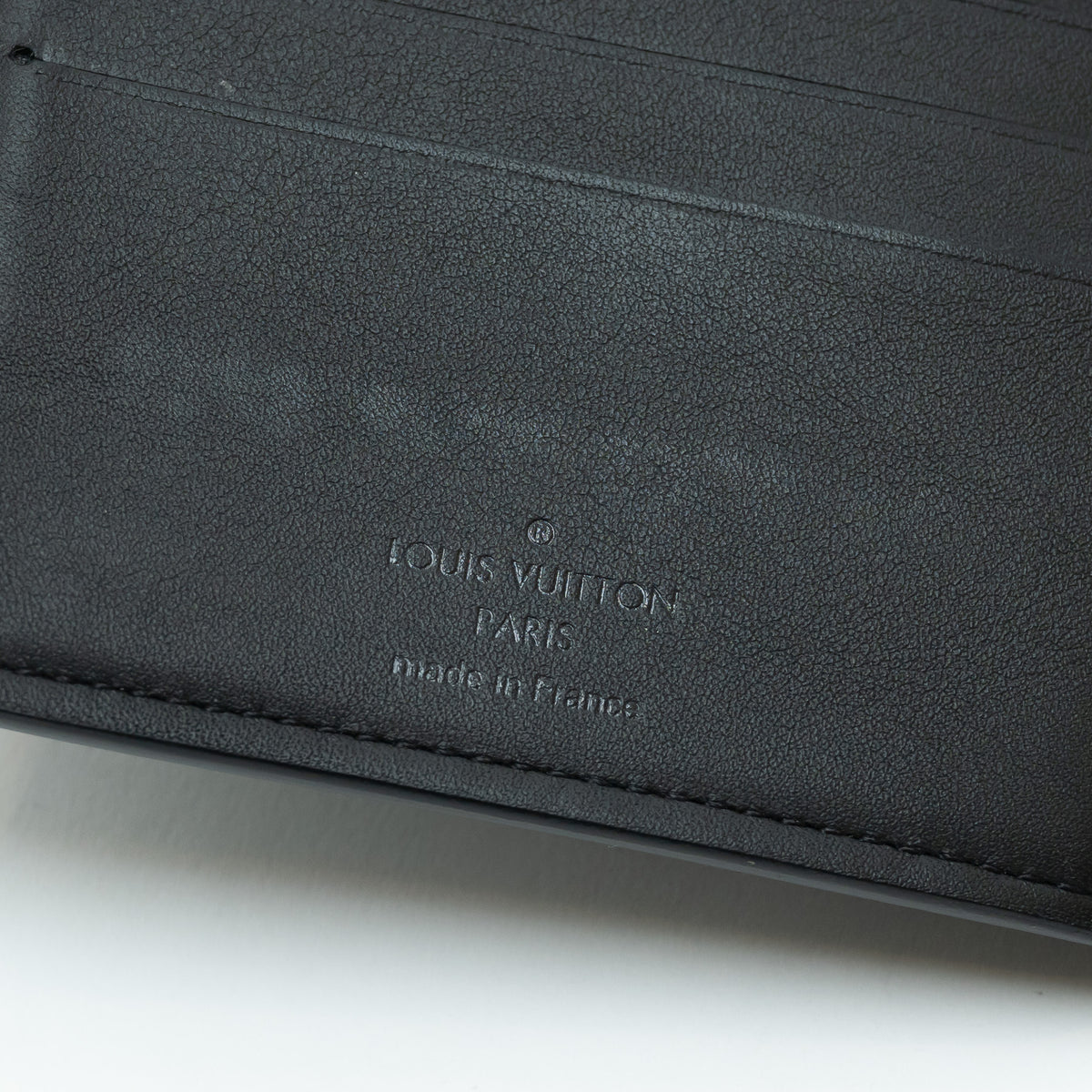 Louis Vuitton Black Smooth Leather Monogram Embossed Bifold Wallet