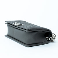 Pre-Loved Chanel™ Grey Pebbled Leather Medium Boy Bag
