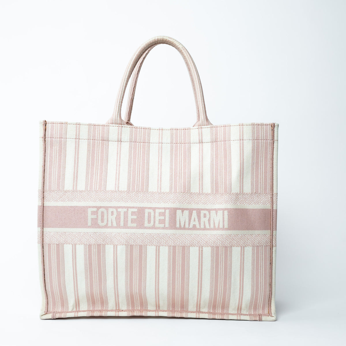 Striped tote bag with 'Forte dei Marmi' text on a white background