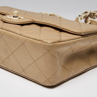 Pre-Loved Chanel ™ Beige Quilted Single Flap Bag
