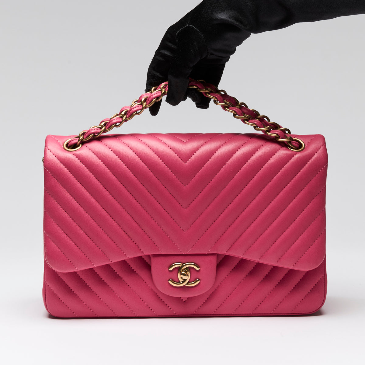 Pre-Loved Chanel™ Pink Lambskin Leather Chevron Jumbo Double Flap Bag