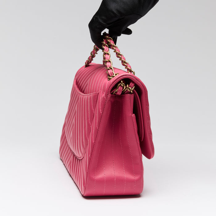 Pre-Loved Chanel™ Pink Lambskin Leather Chevron Jumbo Double Flap Bag