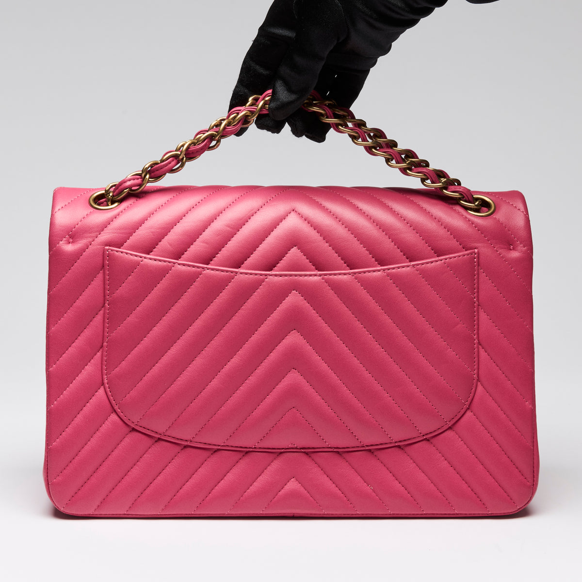 Pre-Loved Chanel™ Pink Lambskin Leather Chevron Jumbo Double Flap Bag