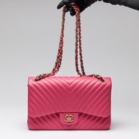 Pre-Loved Chanel™ Pink Lambskin Leather Chevron Jumbo Double Flap Bag