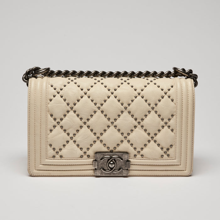 Pre-Loved Chanel™ Cream Grained Leather Boy Bag