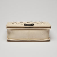 Pre-Loved Chanel™ Cream Grained Leather Boy Bag