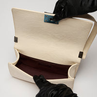 Pre-Loved Chanel™ Cream Grained Leather Boy Bag