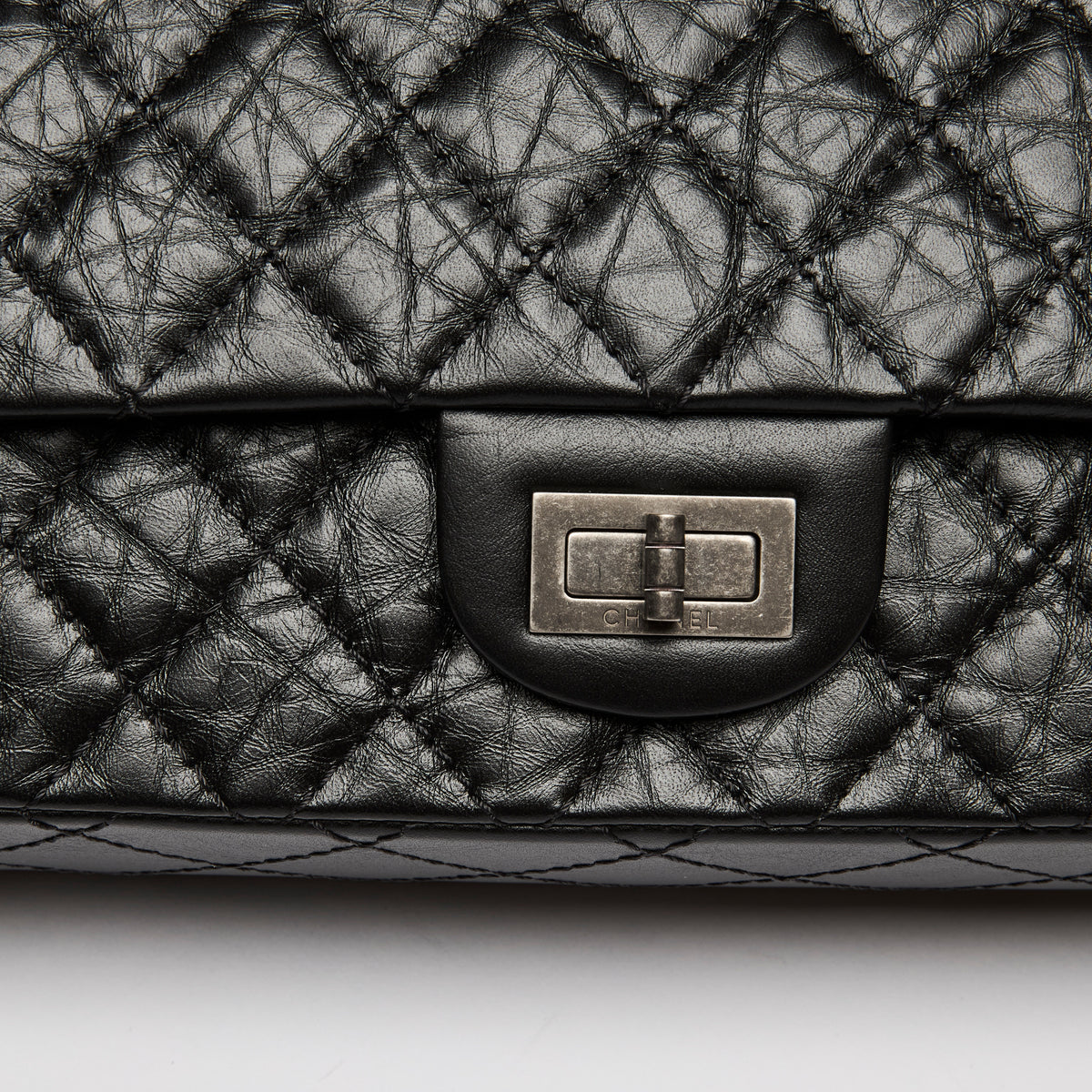 Pre-Loved Chanel™ Black Grained Quilted Leather Small 2.55 Double Flap Bag