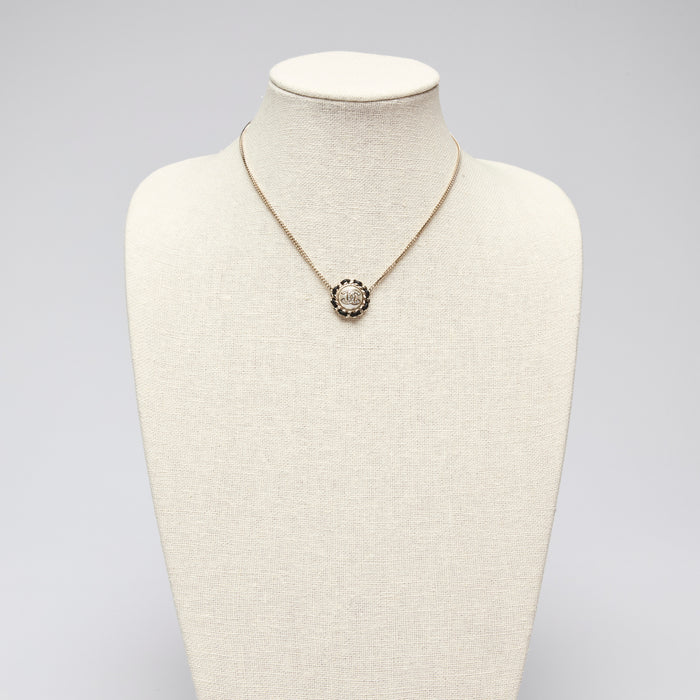 Pre-Loved Chanel™ Gold Tone Interlocking Letter Logo Pendant Necklace.