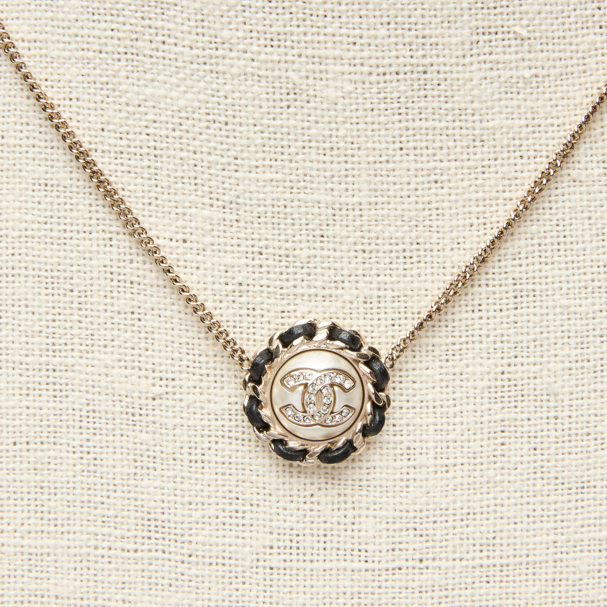 Pre-Loved Chanel™ Gold Tone Interlocking Letter Logo Pendant Necklace.