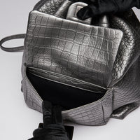 Pre-Loved Chanel™ Silver Croc Embossed Leather Backpack with Metallic Finish
