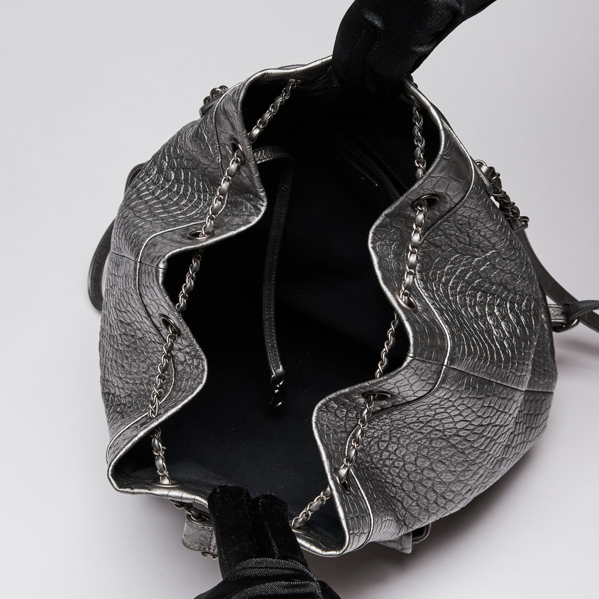 Pre-Loved Chanel™ Silver Croc Embossed Leather Backpack with Metallic Finish