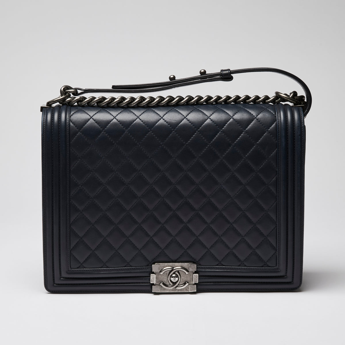 Pre-Loved Chanel ™ Large Navy Boy Bag Style Single Flap Bag with Gunmetal Hardware