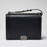 Pre-Loved Chanel ™ Large Navy Boy Bag Style Single Flap Bag with Gunmetal Hardware