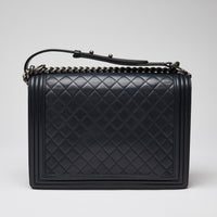 Pre-Loved Chanel ™ Large Navy Boy Bag Style Single Flap Bag with Gunmetal Hardware