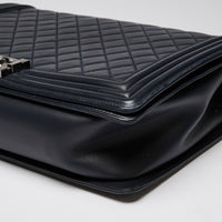 Pre-Loved Chanel ™ Large Navy Boy Bag Style Single Flap Bag with Gunmetal Hardware