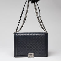 Pre-Loved Chanel ™ Large Navy Boy Bag Style Single Flap Bag with Gunmetal Hardware