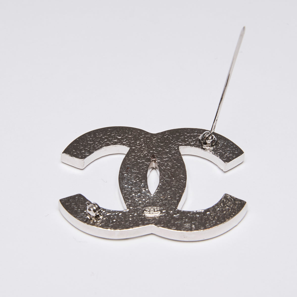 Pre-Loved Chanel™ Interlocking Letter Logo Baguette Crystal Brooch