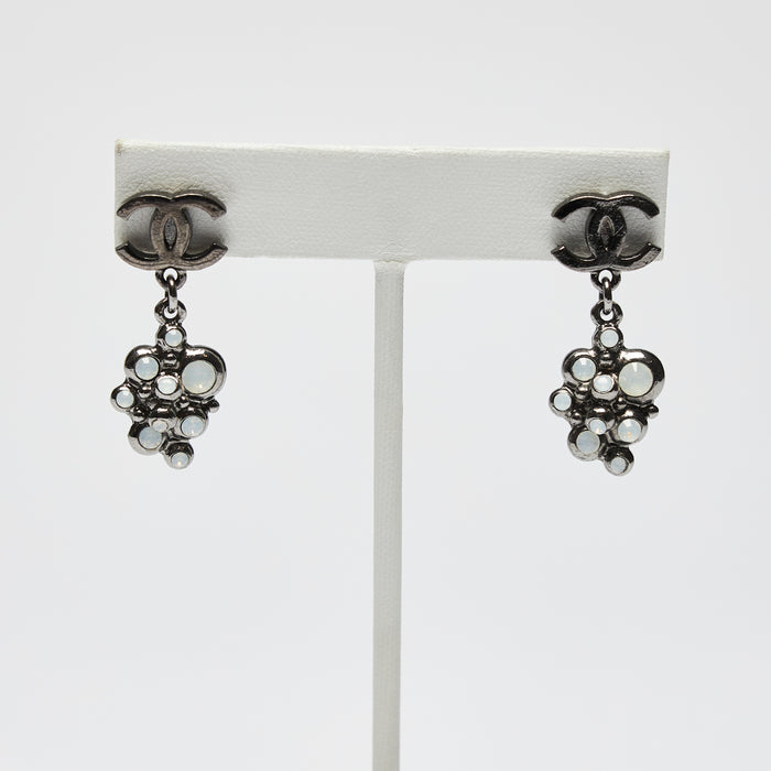 Excellent Pre-Loved Dark Shiny Silver Tone Logo Earrings with Crystal Clustered Drop. (front)