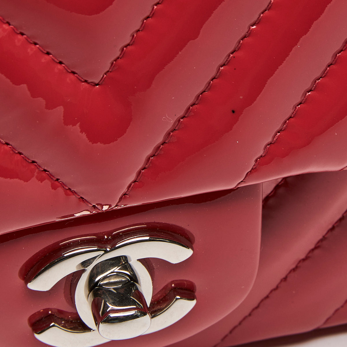 Pre-Loved Chanel™ Red Patent Leather Mini Chevron Flap Handbag