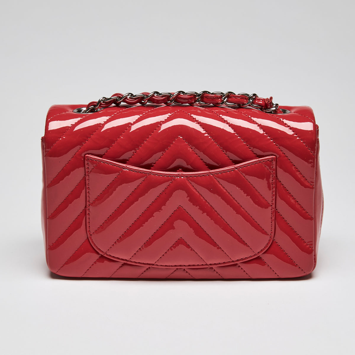 Pre-Loved Chanel™ Red Patent Leather Mini Chevron Flap Handbag