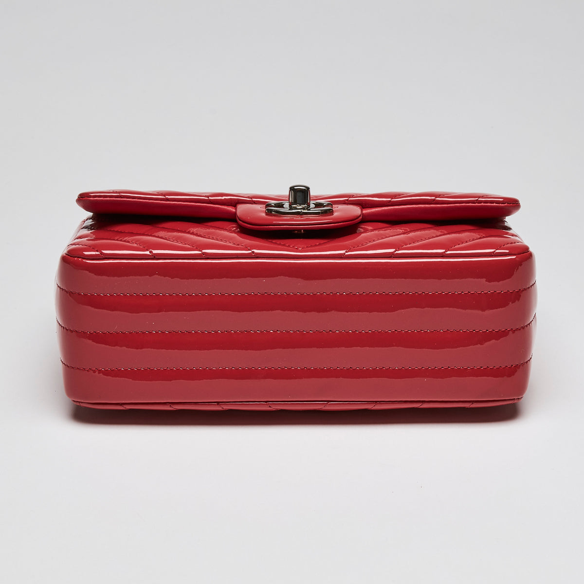 Pre-Loved Chanel™ Red Patent Leather Mini Chevron Flap Handbag