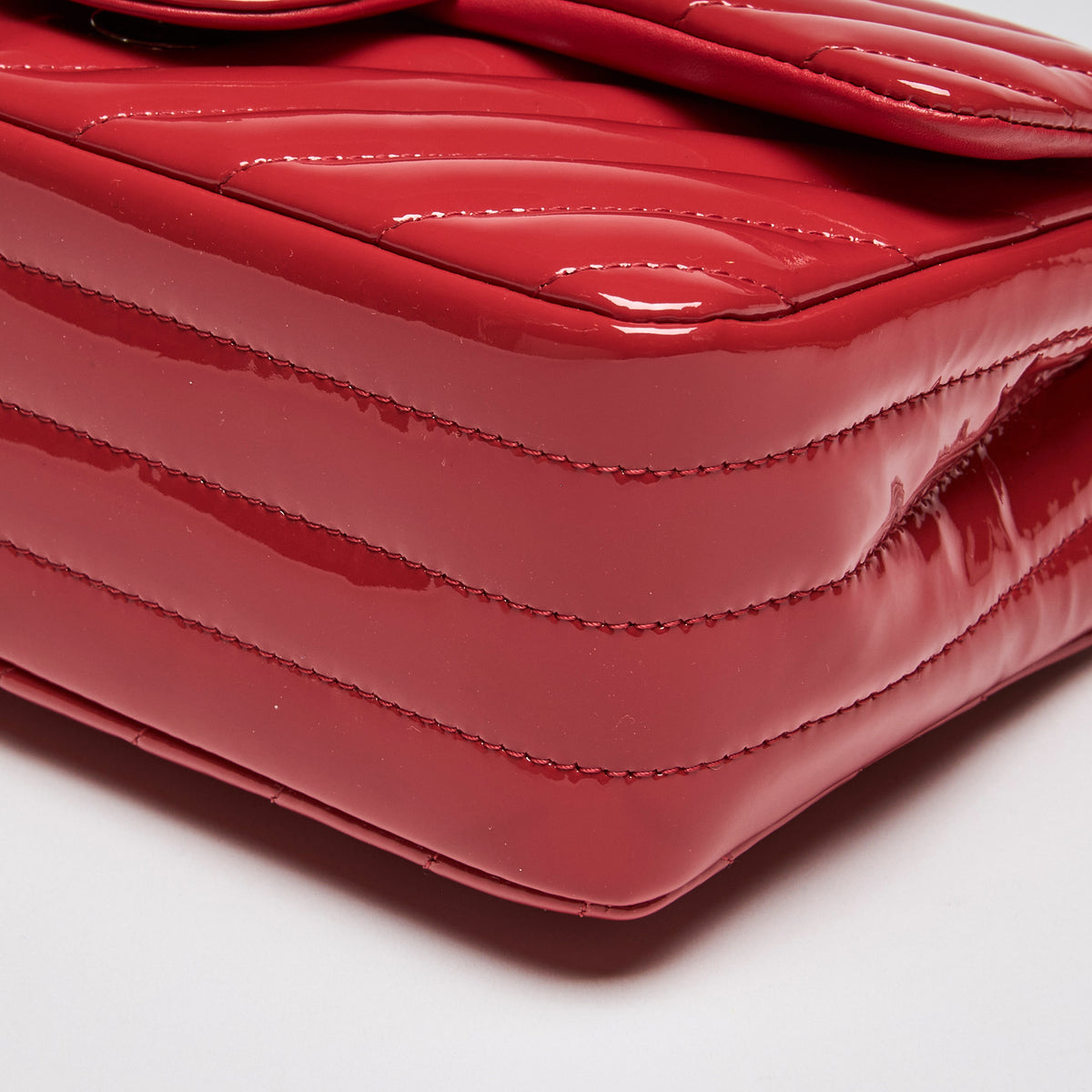 Pre-Loved Chanel™ Red Patent Leather Mini Chevron Flap Handbag