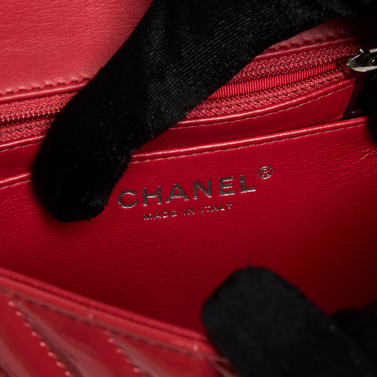 Pre-Loved Chanel™ Red Patent Leather Mini Chevron Flap Handbag