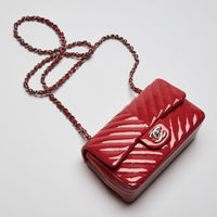 Pre-Loved Chanel™ Red Patent Leather Mini Chevron Flap Handbag