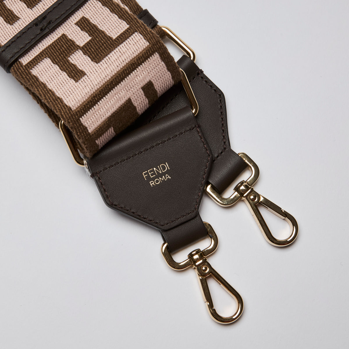 Excellent Pre-Loved Brown and Light Pink Fabric Adjustable Guitar Strap with Gold Tone Hardware. (logo)