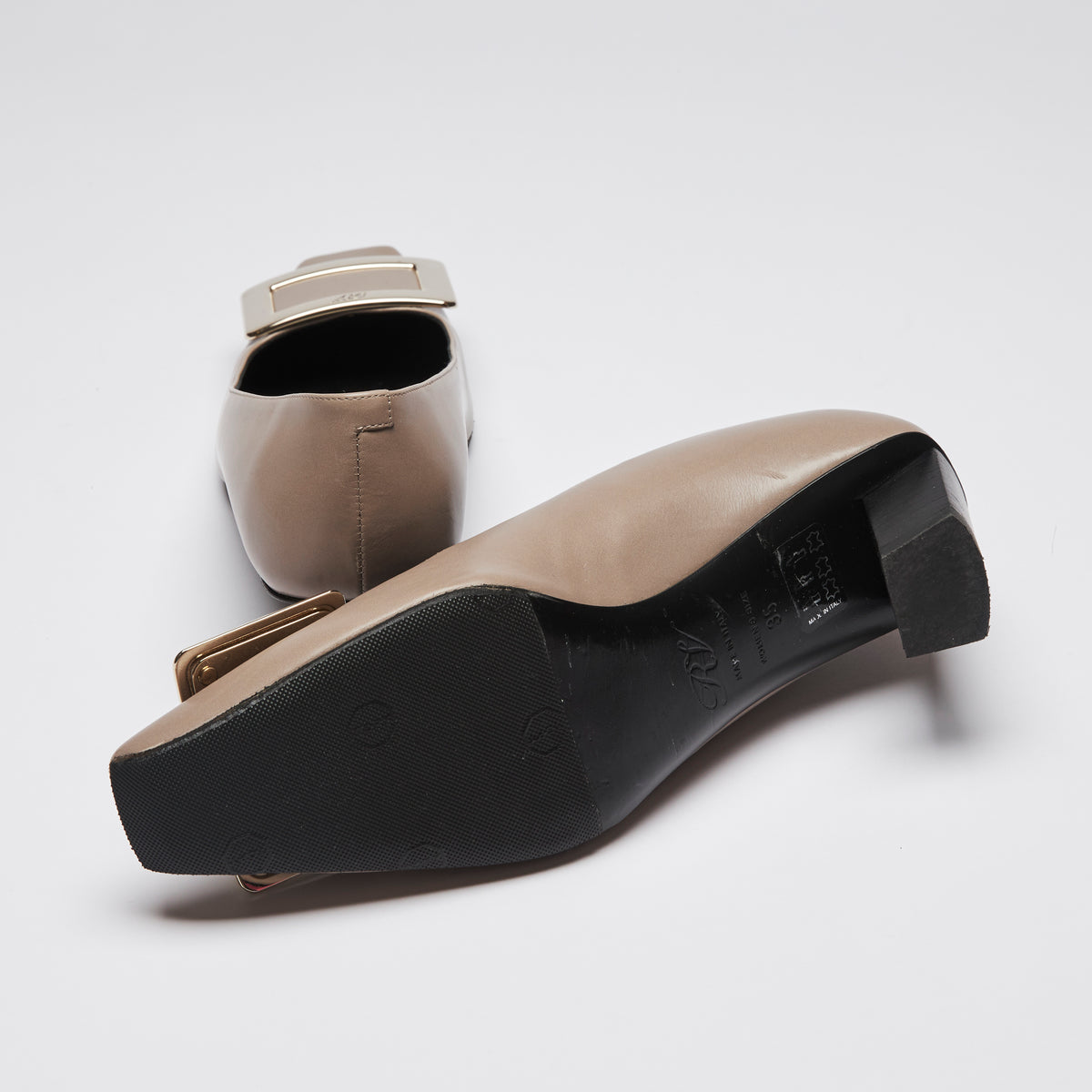 Pre-Loved Taupe Smooth Leather Square Toe Kitten Heels with Black Leather Lining and Silver Buckle Ornament.(bottom)