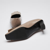 Pre-Loved Taupe Smooth Leather Square Toe Kitten Heels with Black Leather Lining and Silver Buckle Ornament.(bottom)