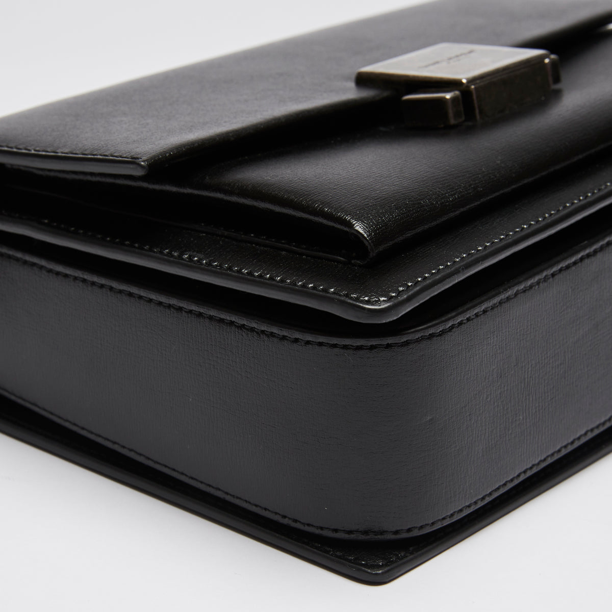 Excellent Pre-Loved Black Smooth Leather Top Handle Flap Over Shoulder Bag with Aged Silver Tone Hardware. (corner)