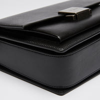 Excellent Pre-Loved Black Smooth Leather Top Handle Flap Over Shoulder Bag with Aged Silver Tone Hardware. (corner)