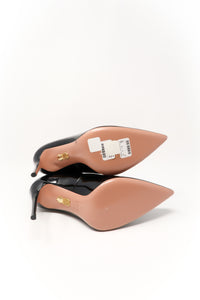 black patent leather heels with black nylon ankle socket attachment (bottom view)