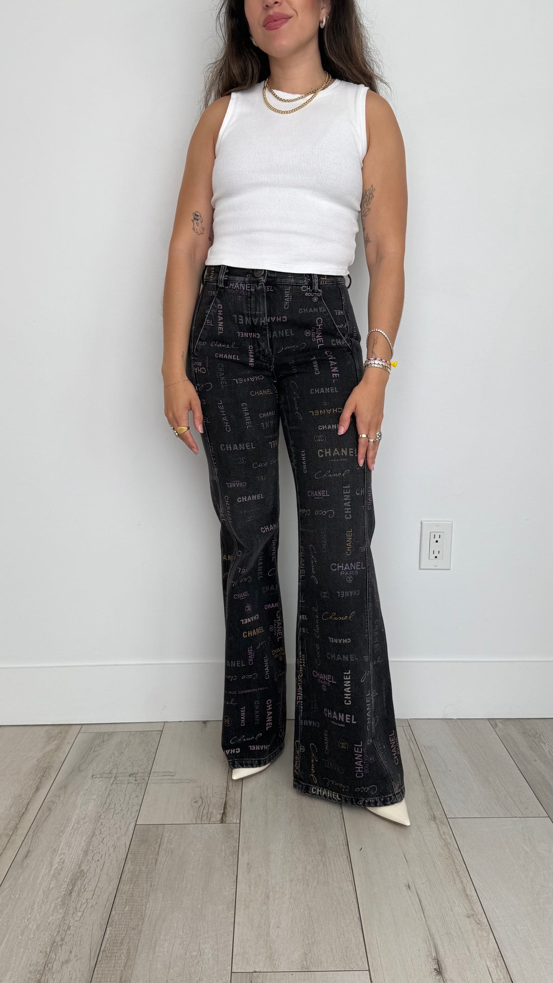 Pre-Loved Chanel™ Black Jeans with Multicolour Pink Logo Print Size 34