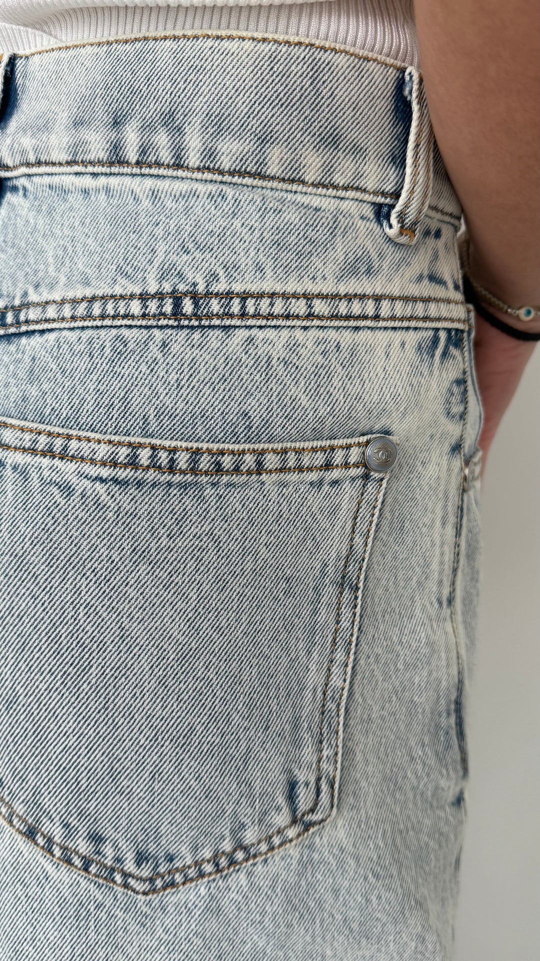 Pre-Loved Chanel™ Light Wash Wide Leg Bambi Motif Jeans Size 34