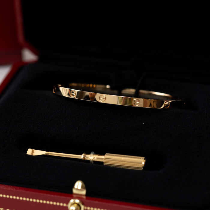 Cartier 18k Yellow Gold Small Love Bracelet close up in box with screw driver