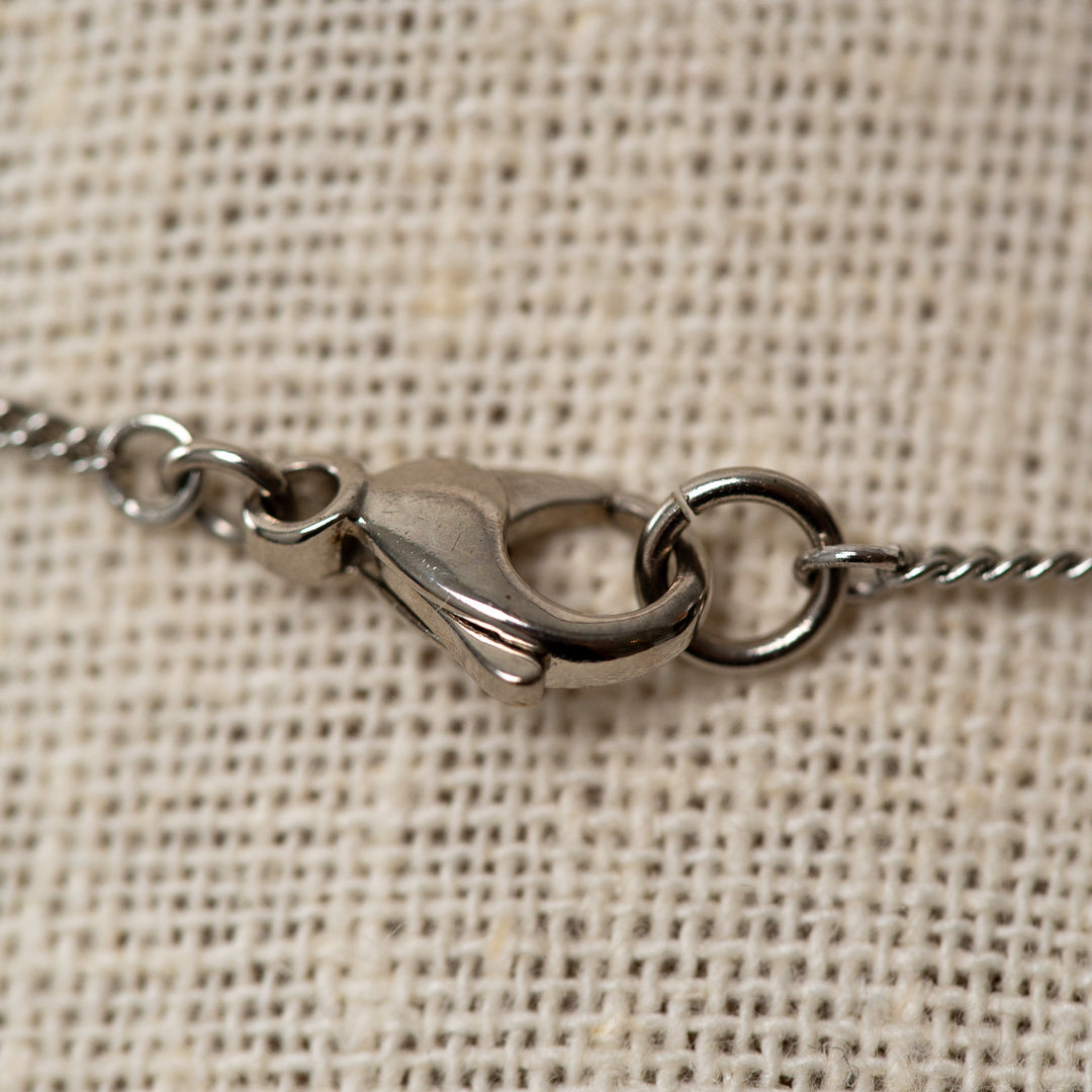 Pre-Loved Chanel™ Silver Tone Necklace with Double Interlocking Logo Pendant