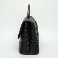 Pre-Loved Chanel™ Black Pebbled Leather Medium Coco Handle Bag with Burgundy Lizard Leather Handle