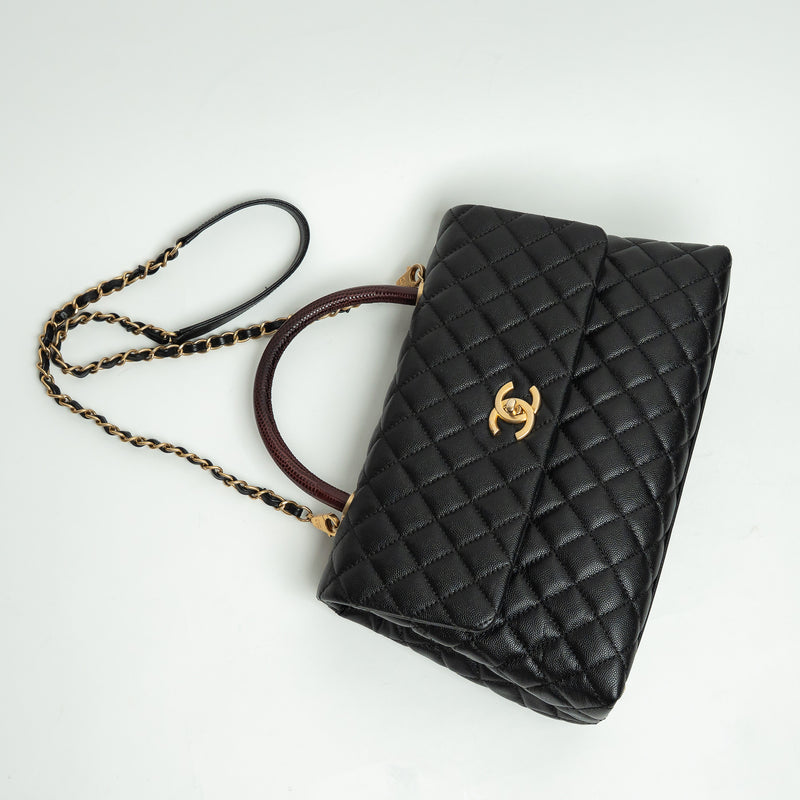 Pre-Loved Chanel™ Black Pebbled Leather Medium Coco Handle Bag with Burgundy Lizard Leather Handle