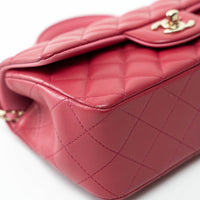 Pre-Loved Chanel™ Pink Raspberry Grained Leather Mini Top Handle Bag