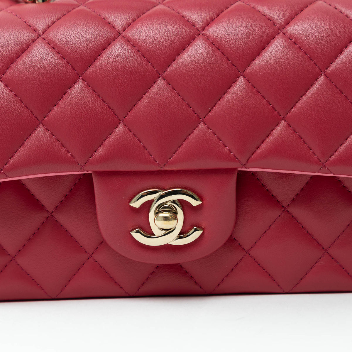 Pre-Loved Chanel™ Pink Raspberry Grained Leather Mini Top Handle Bag