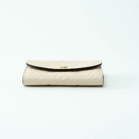 Louis Vuitton Ivory Embossed Monogram Leather Wallet