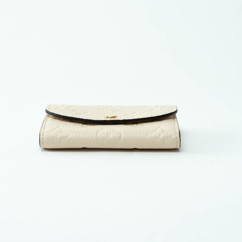 Louis Vuitton Ivory Embossed Monogram Leather Wallet